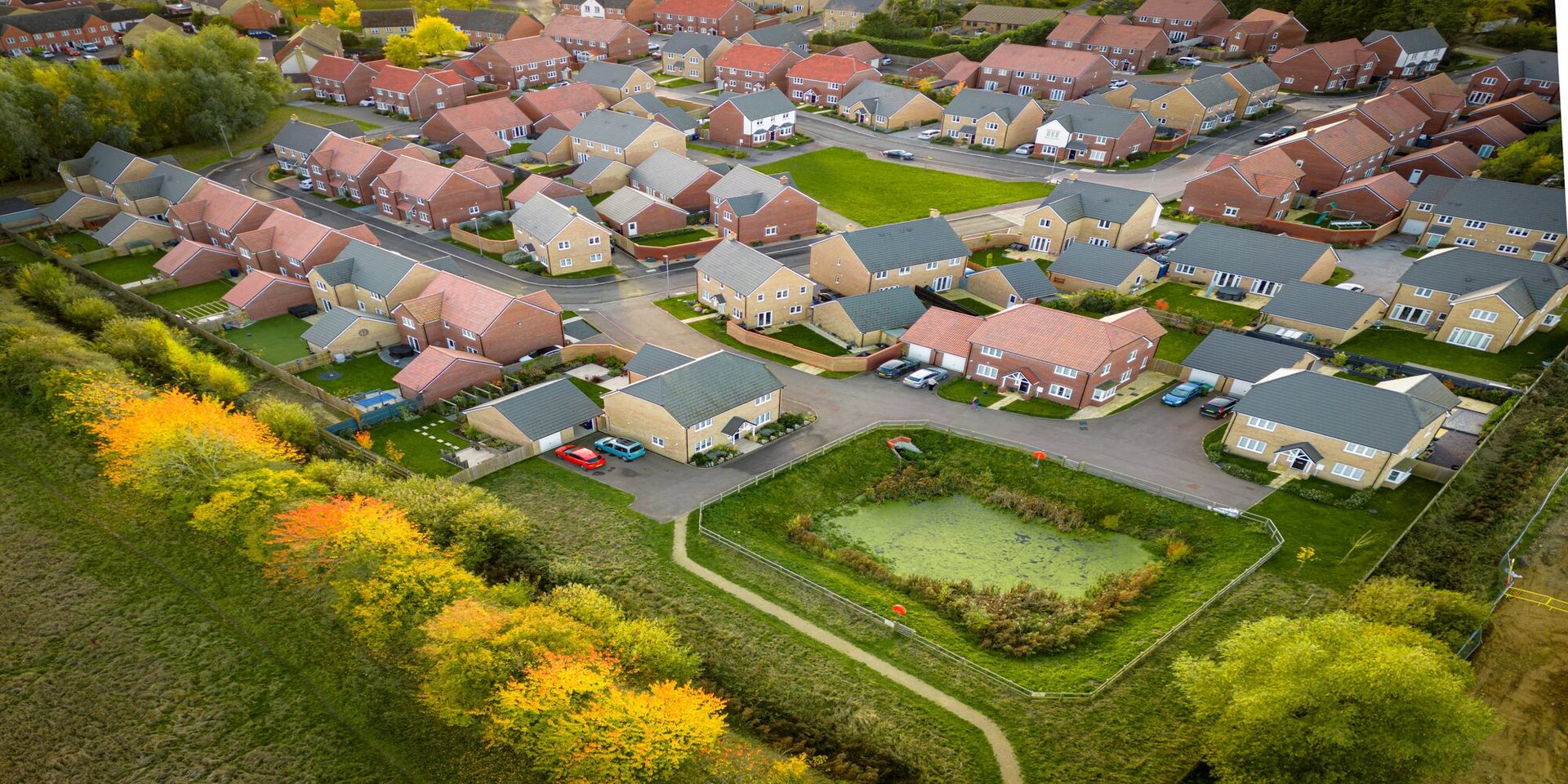 Attenuation pond and swale on a completed development